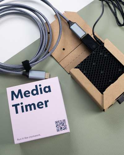 Adaptables Media timer showcased on a table